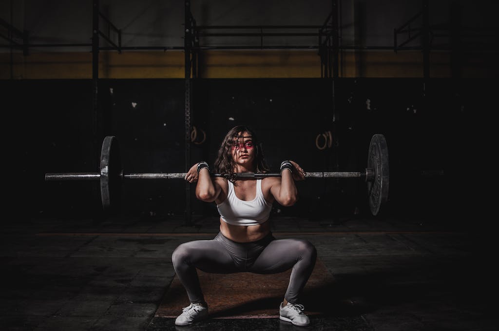 Woman Lifting Barbell